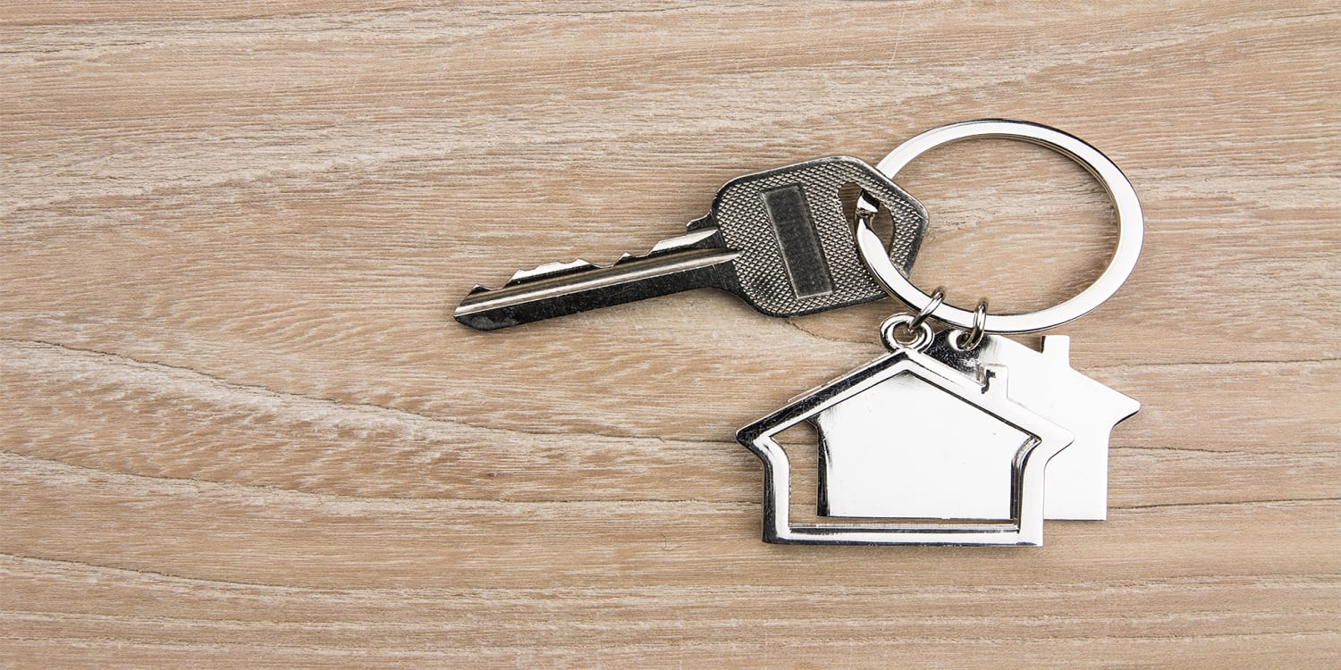 House keys on a table to conceptualize home sale
